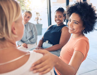 Empathy, support and team of women talk with friends