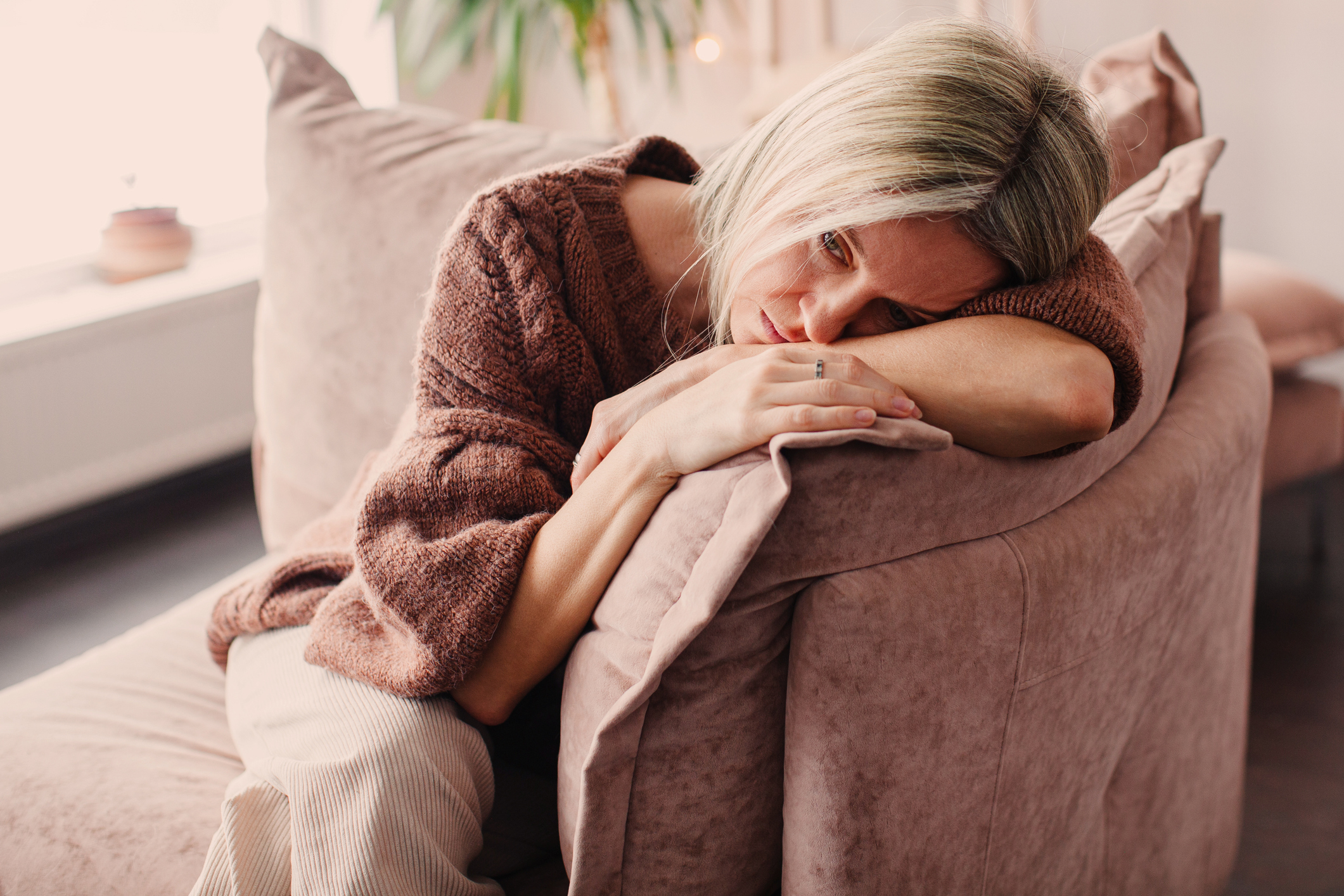 Sad Woman On Sofa