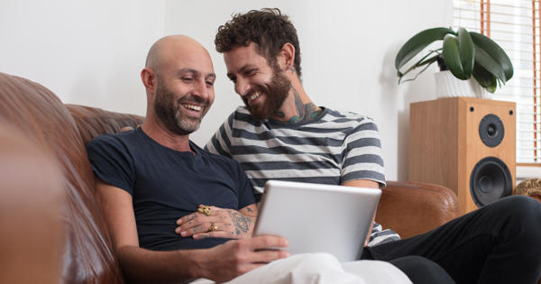 Gay couple on sofa