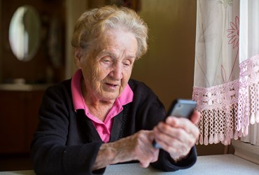 Elderly woman on smartphone  - stock