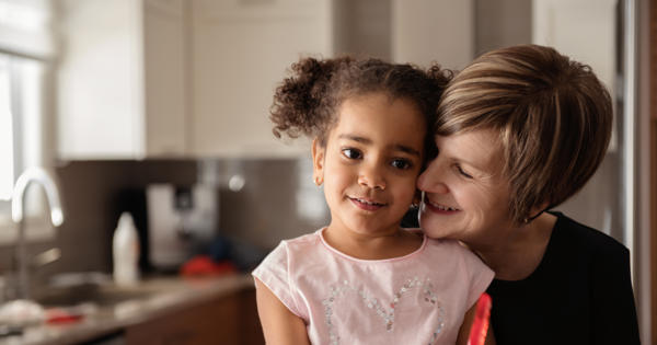 Mother and daughter kitchen - stock