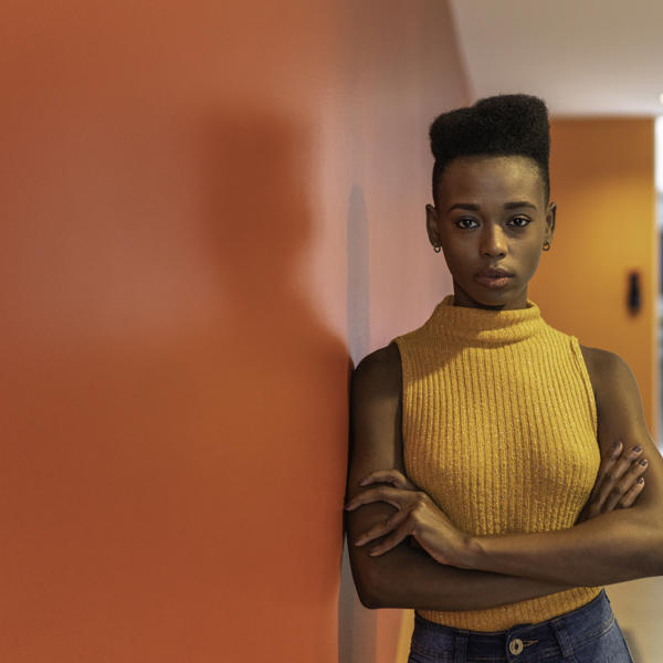 Young black woman arms folded