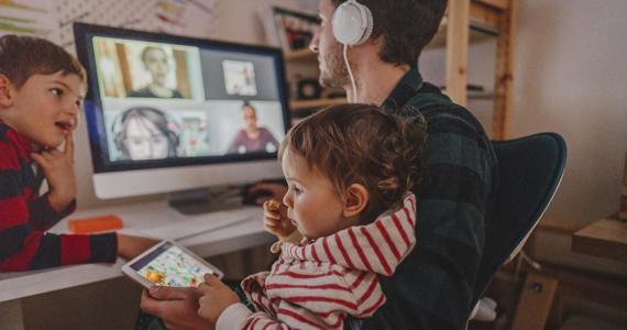 White father working from home with children White father working from home with children