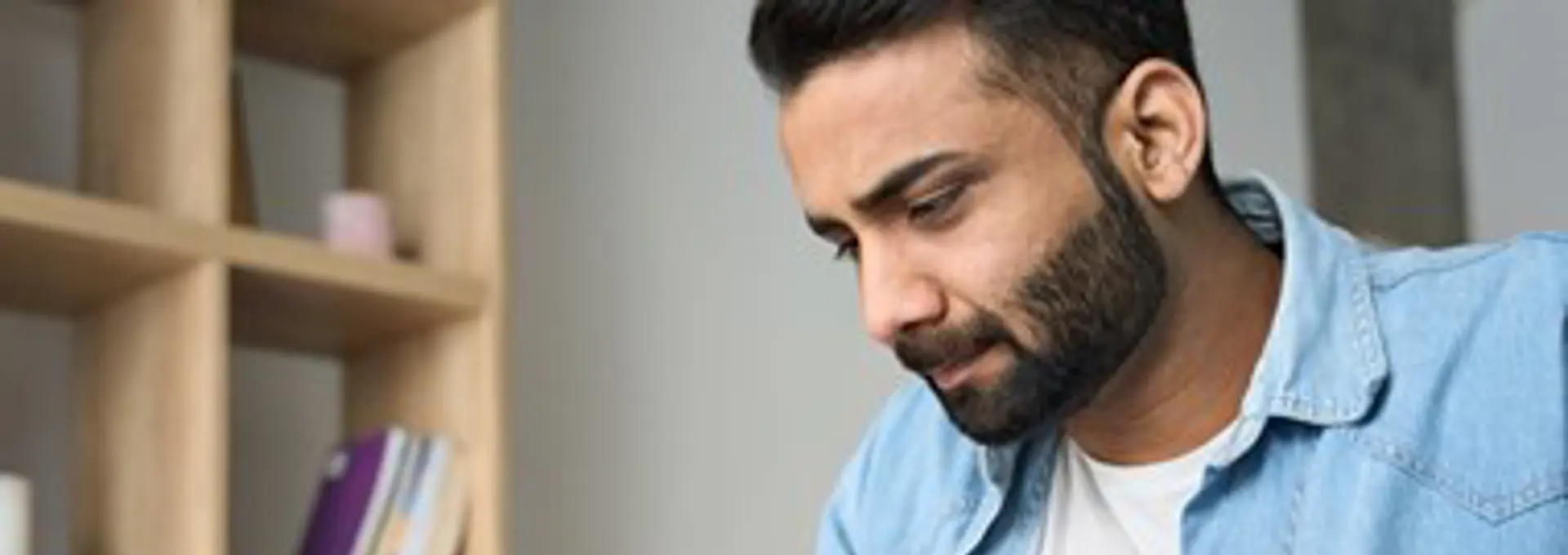 Indian Man Checking Details - stock