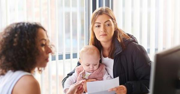 Young mother getting advice - stock