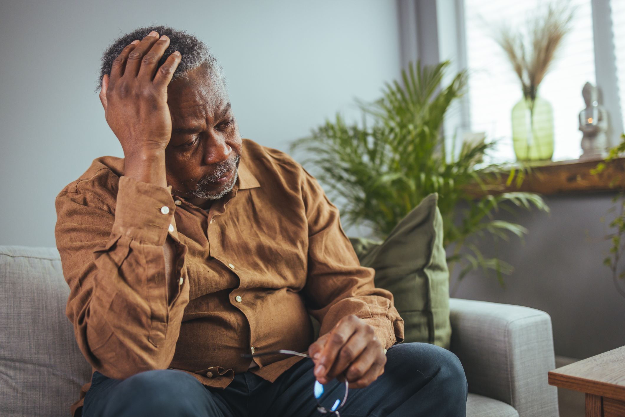 Sad Man On Sofa