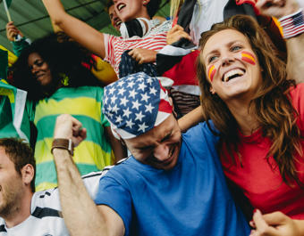 Sports Fans Celebrating Victory At A Stadium Event