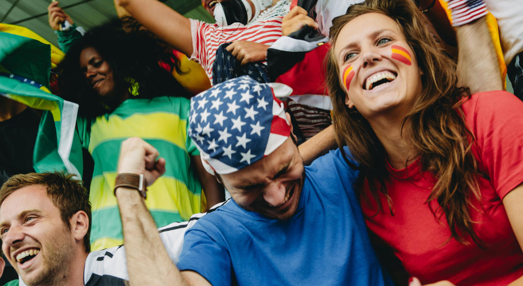 Sports Fans Celebrating Victory At A Stadium Event