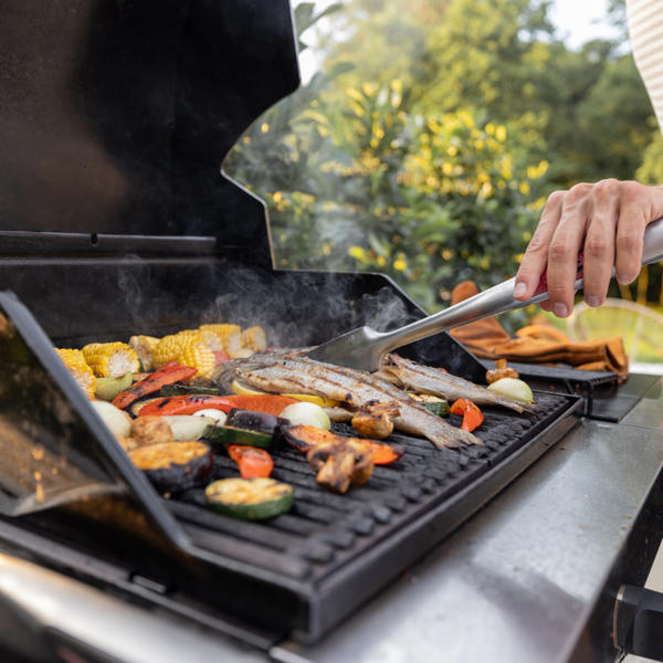 Grilling Fish And Corn On A Grill