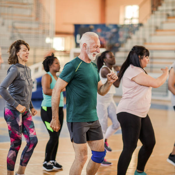 Older man doing aerobics