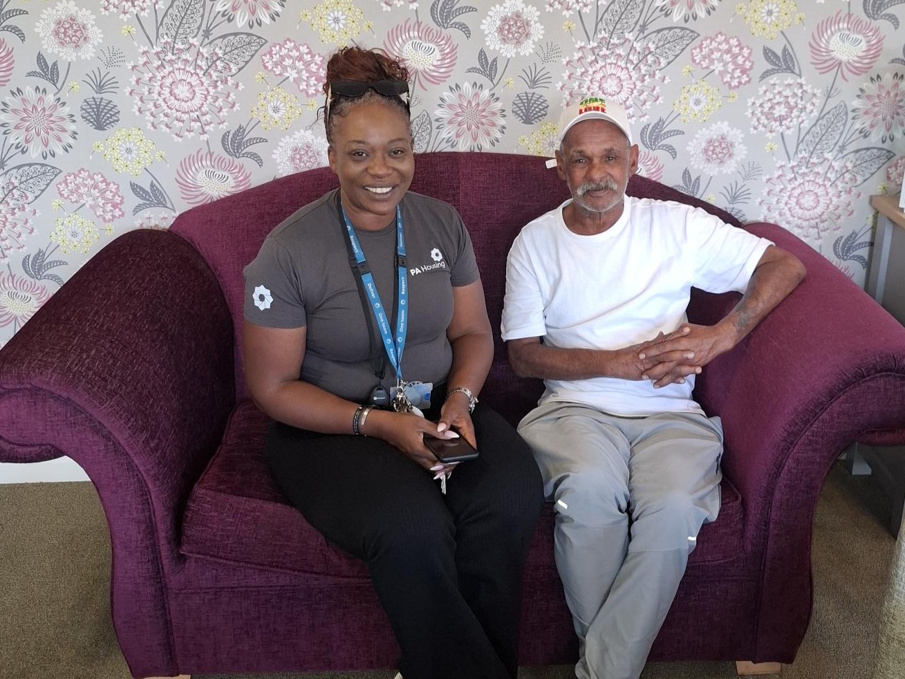 NC And Resident On Sofa