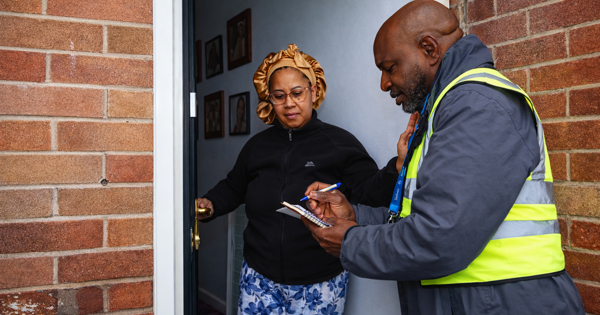 NC With Resident On Doorstep