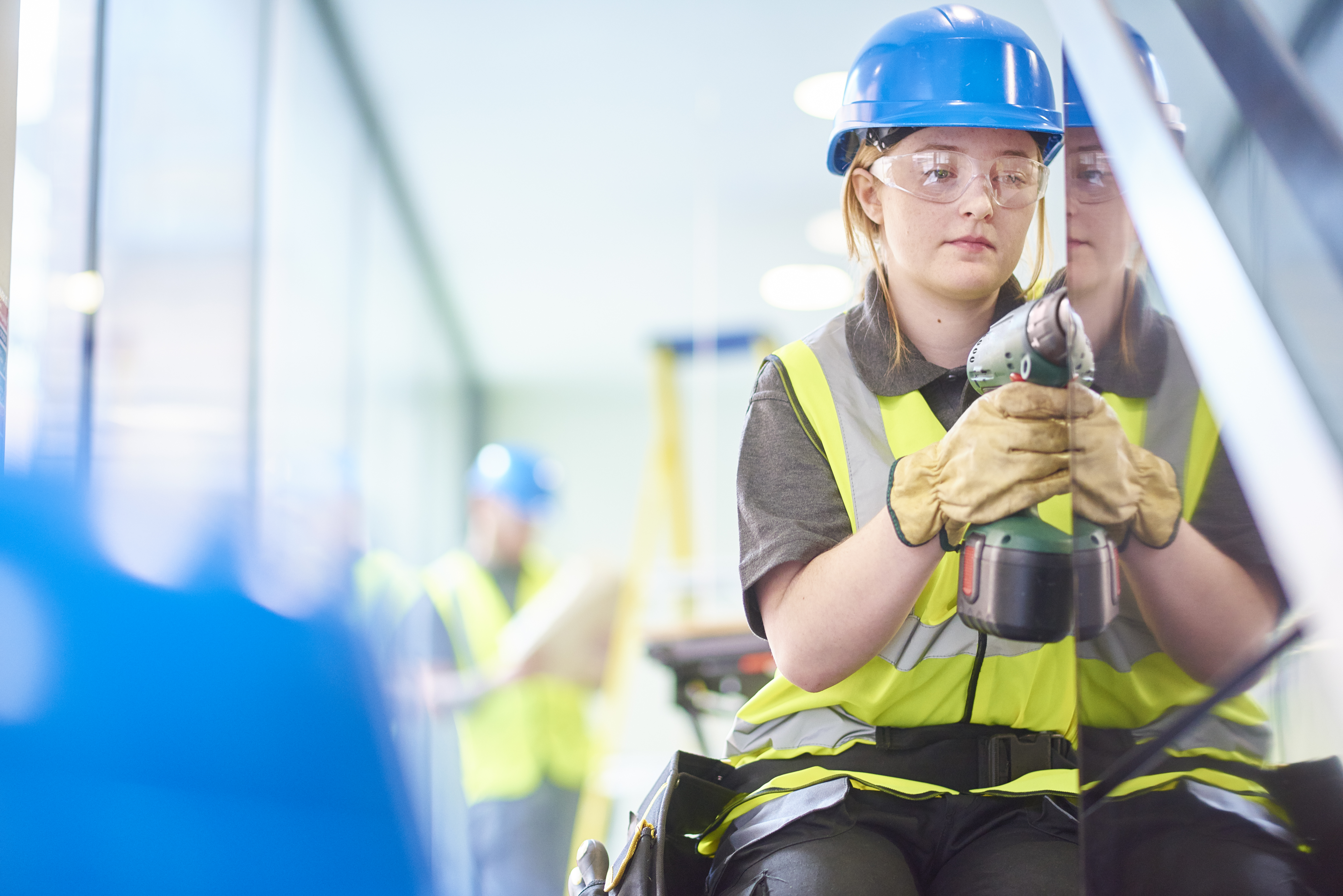 Young female construction worker