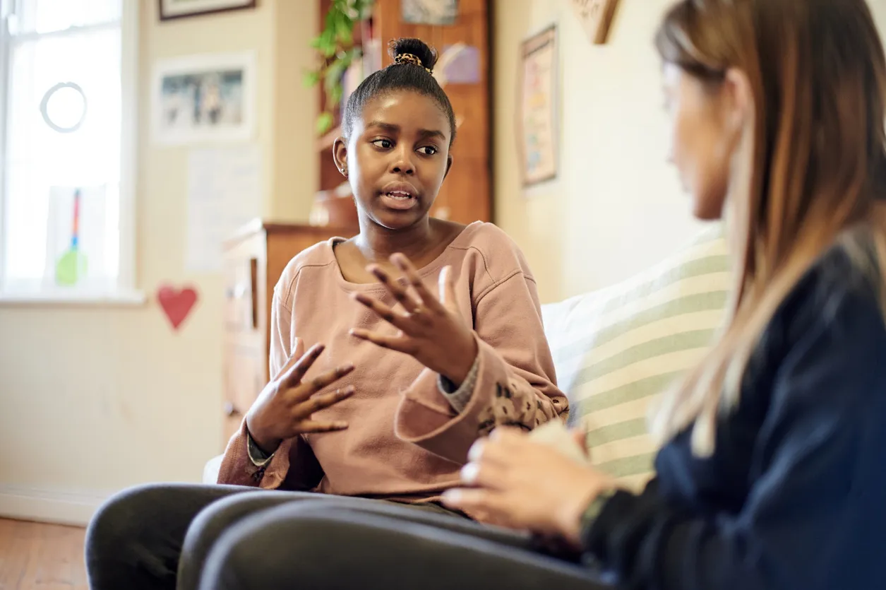 Counselling, child and psychologist woman talking