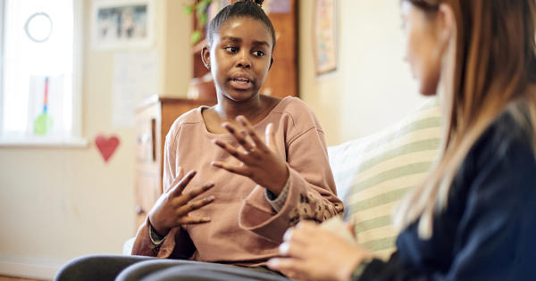 Counselling, child and psychologist woman talking