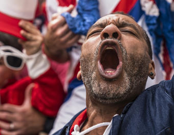 Euphoric Englishman Shouting And Celebrating After National Team Scores Goal