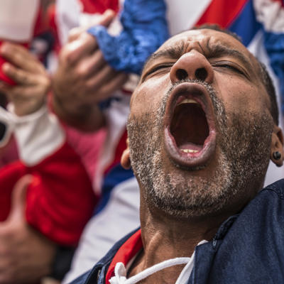 Euphoric Englishman Shouting And Celebrating After National Team Scores Goal