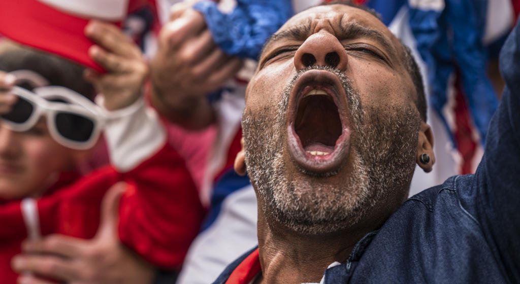 Euphoric Englishman Shouting And Celebrating After National Team Scores Goal