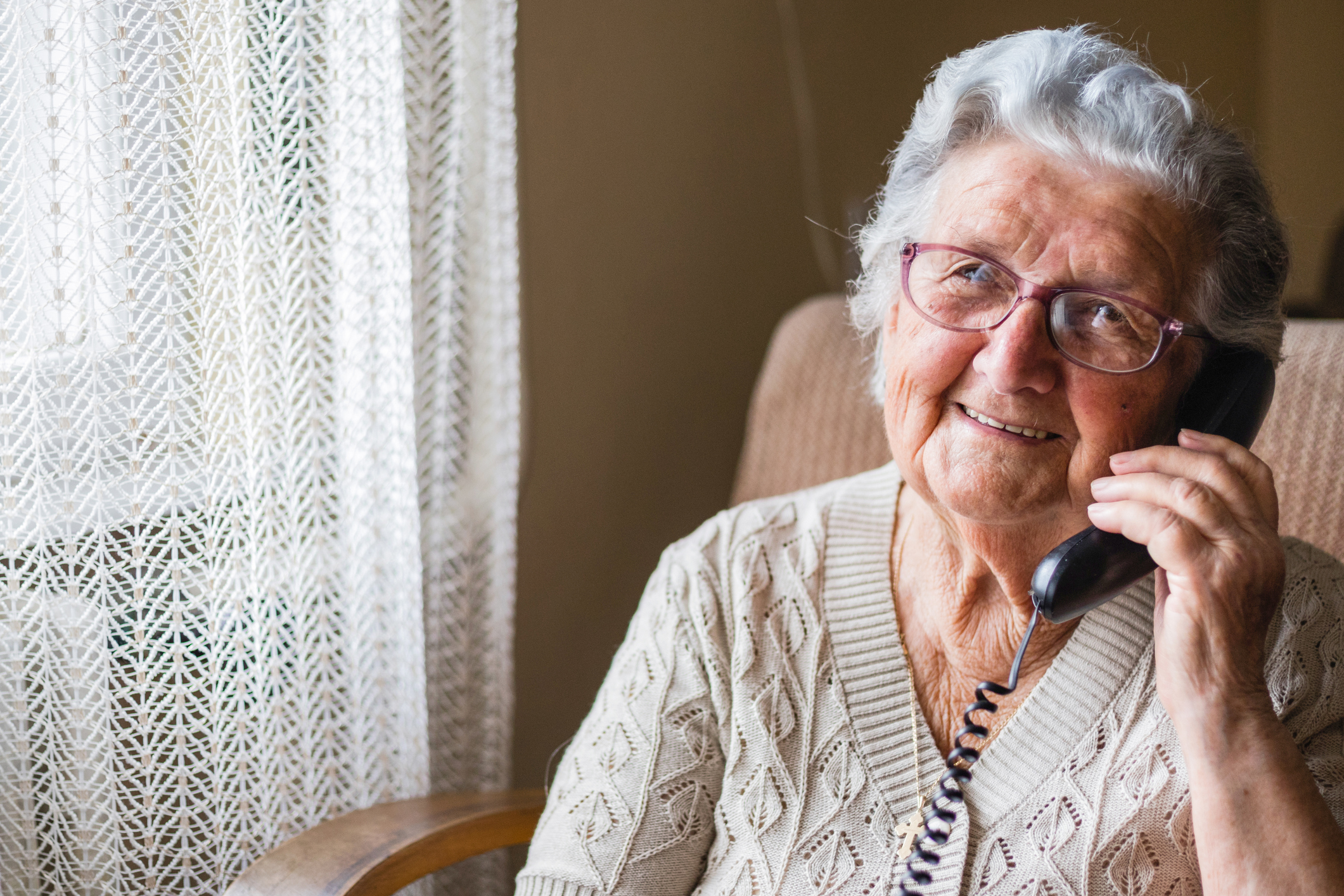 Old Lady On Landline Phone
